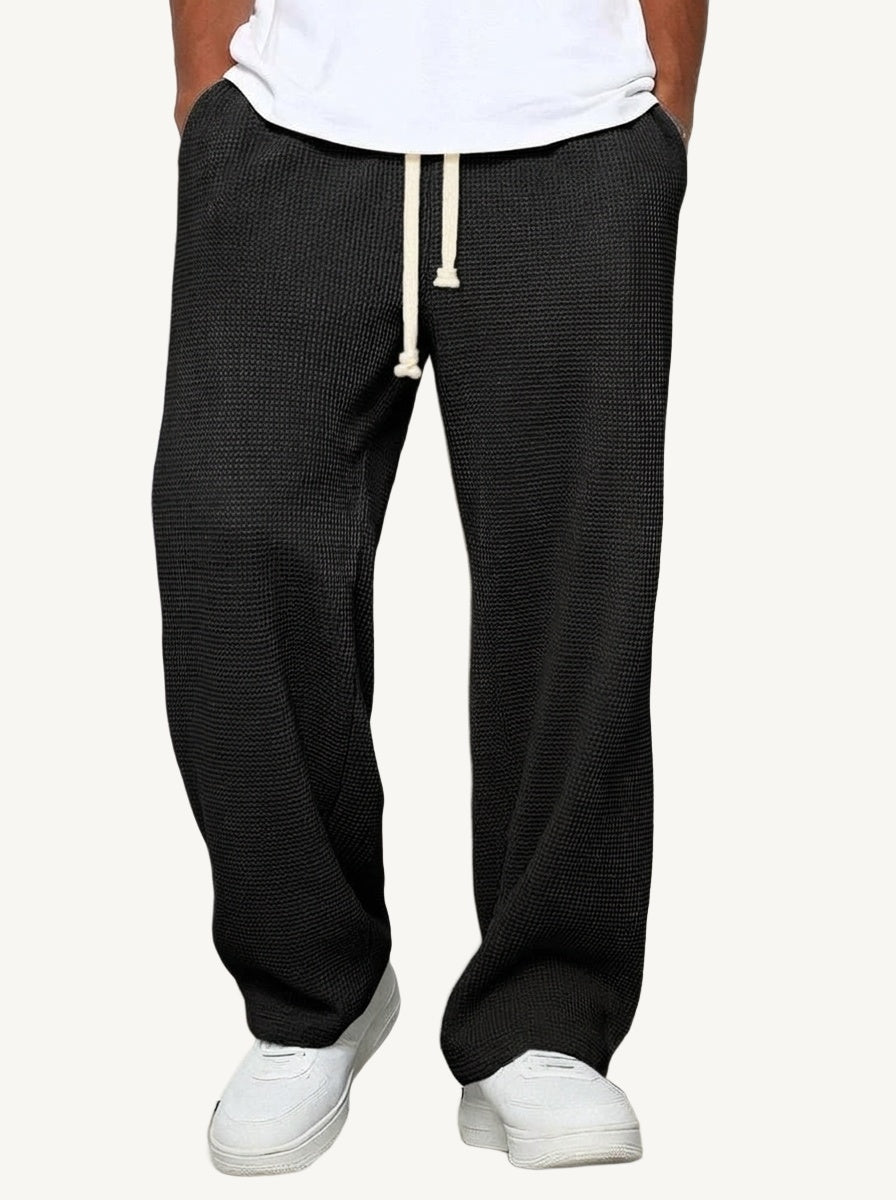 Men's relaxed wide-leg textured trousers with elasticated drawstring waist