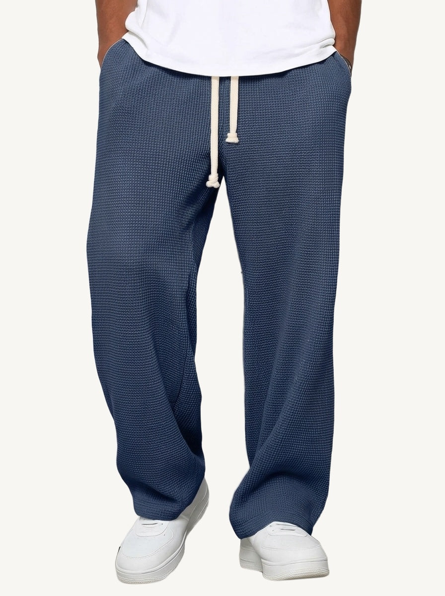Men's relaxed wide-leg textured trousers with elasticated drawstring waist