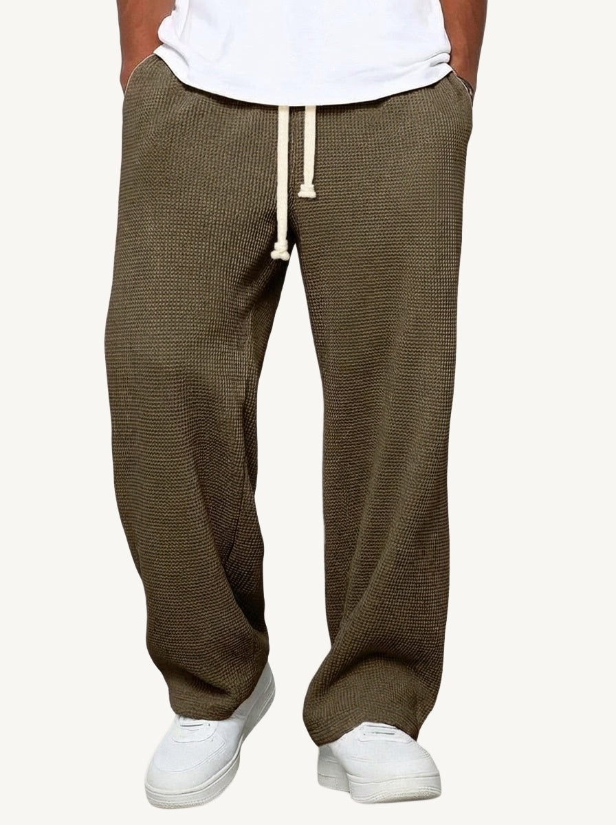 Men's relaxed wide-leg textured trousers with elasticated drawstring waist