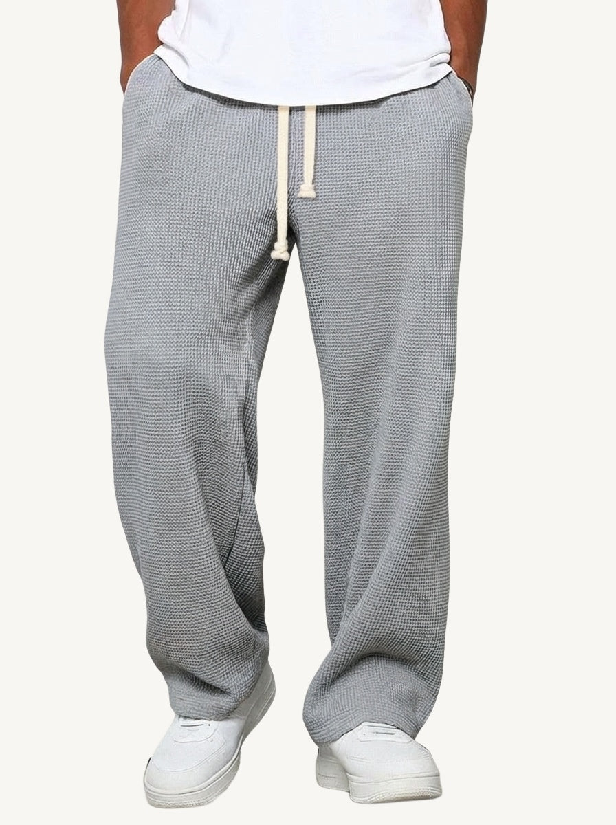 Men's relaxed wide-leg textured trousers with elasticated drawstring waist