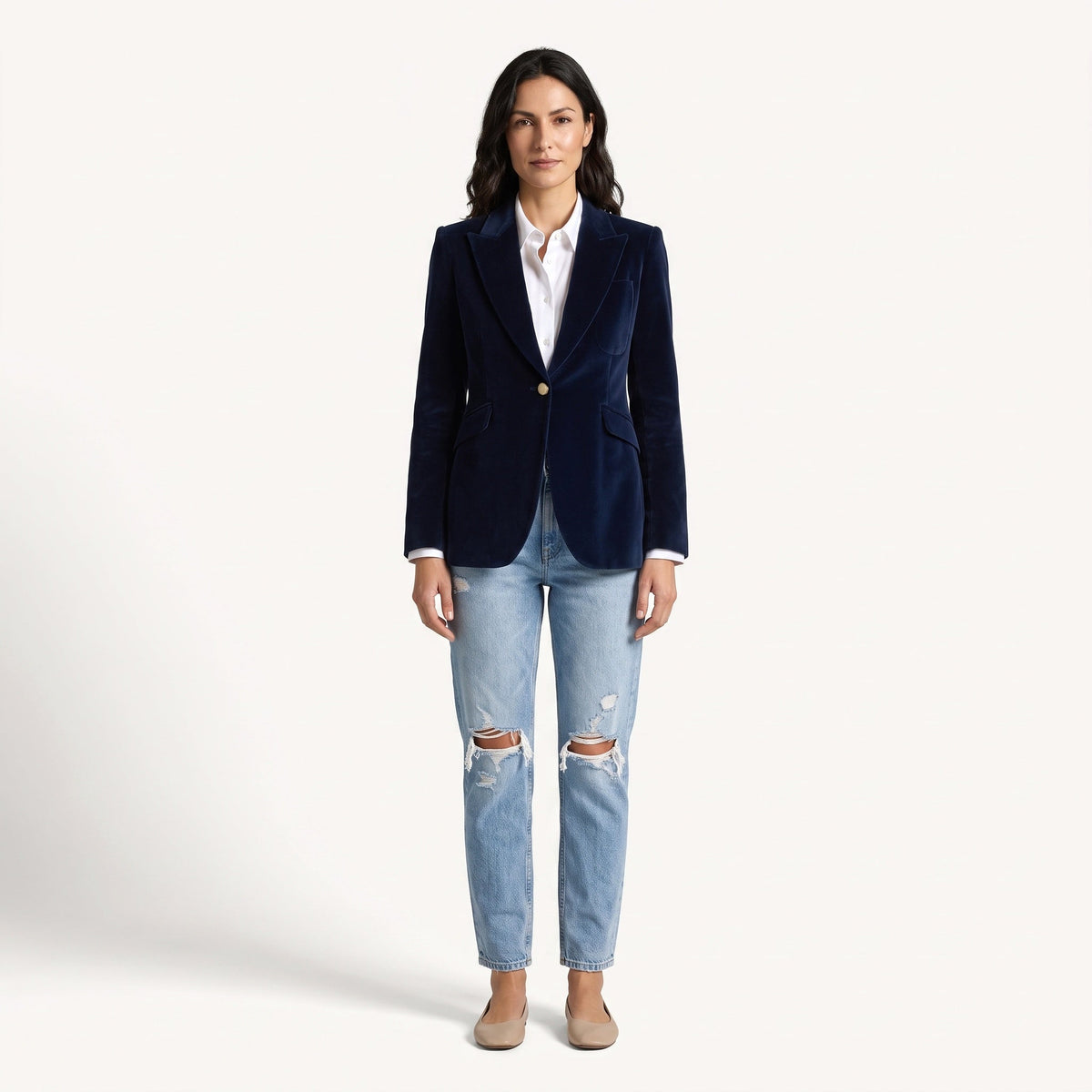 Women's navy velvet blazer with notched lapels, long sleeves and flap pockets