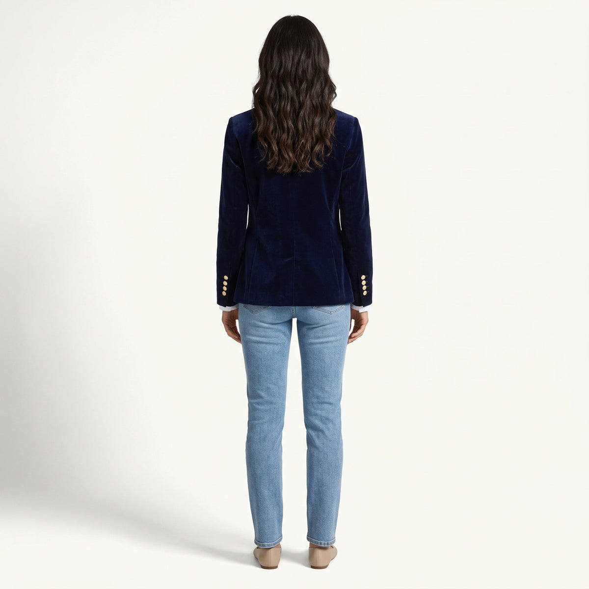 Women's navy velvet blazer with notched lapels, long sleeves and flap pockets