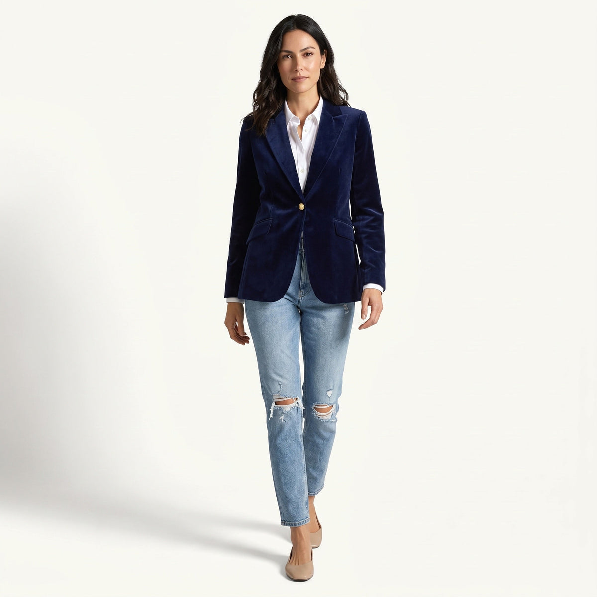 Women's navy velvet blazer with notched lapels, long sleeves and flap pockets