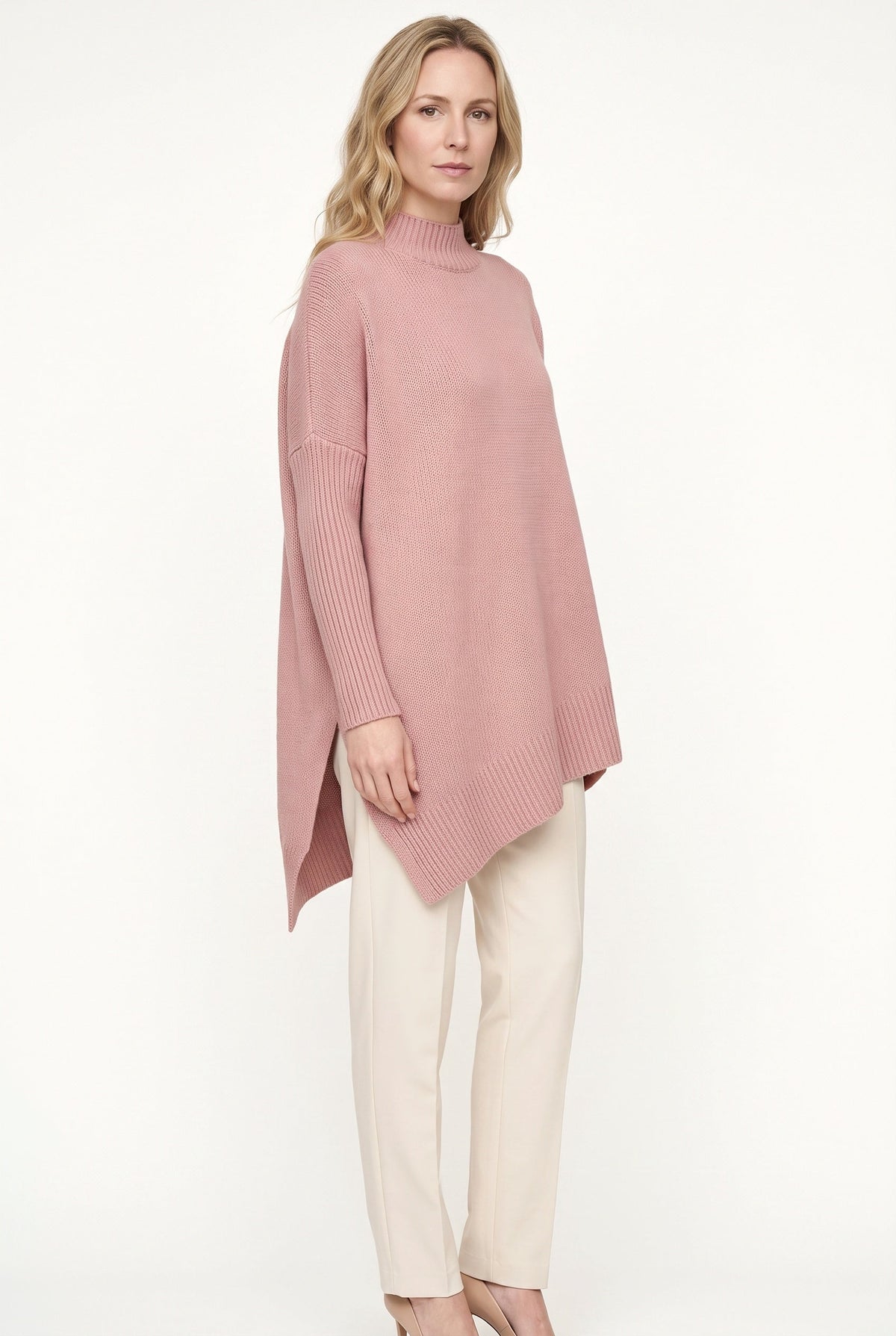 Women's oversized turtleneck sweater with long sleeves and asymmetric hem