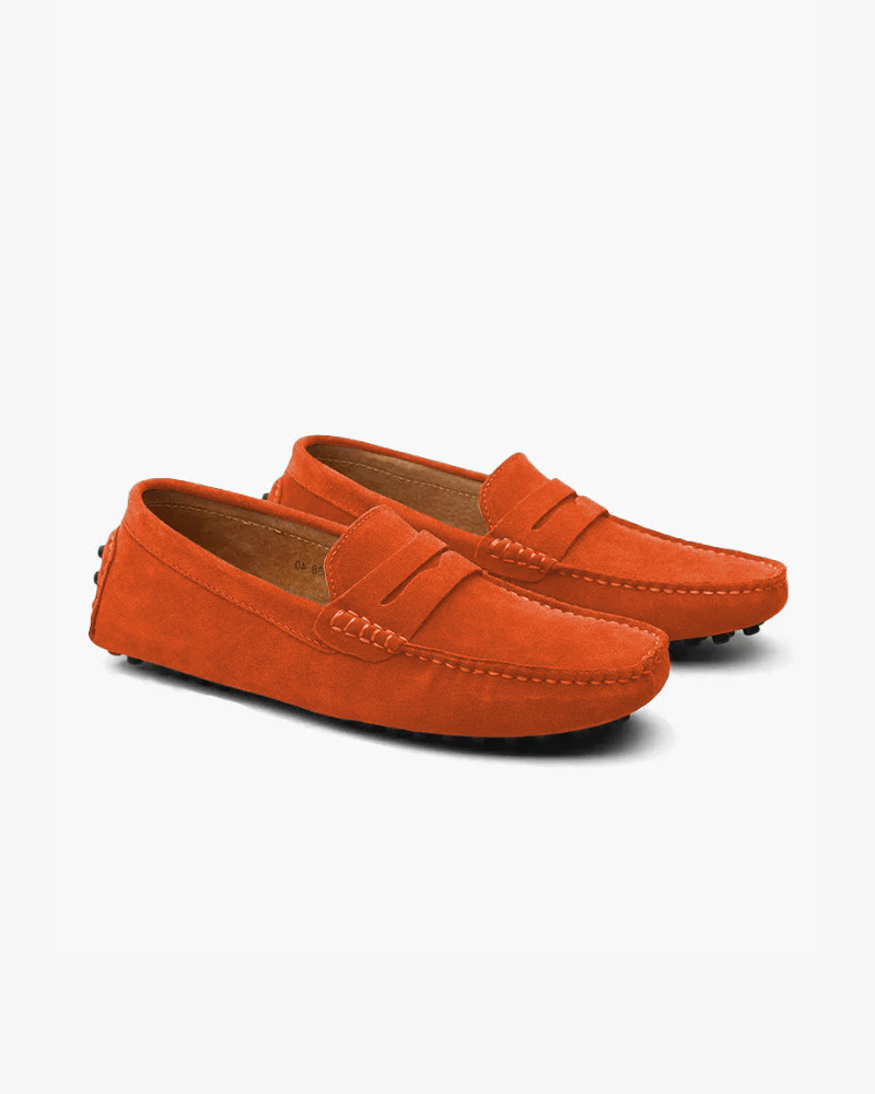 Men's penny loafers with moc toes, stitched trim and low flat soles