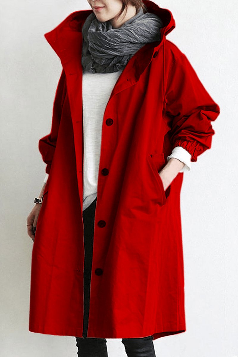 Women's oversized hooded rain parka coat with button front and long sleeves