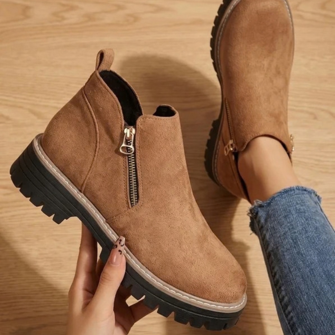 Women's ankle boots with side zips, low heels and lugged soles