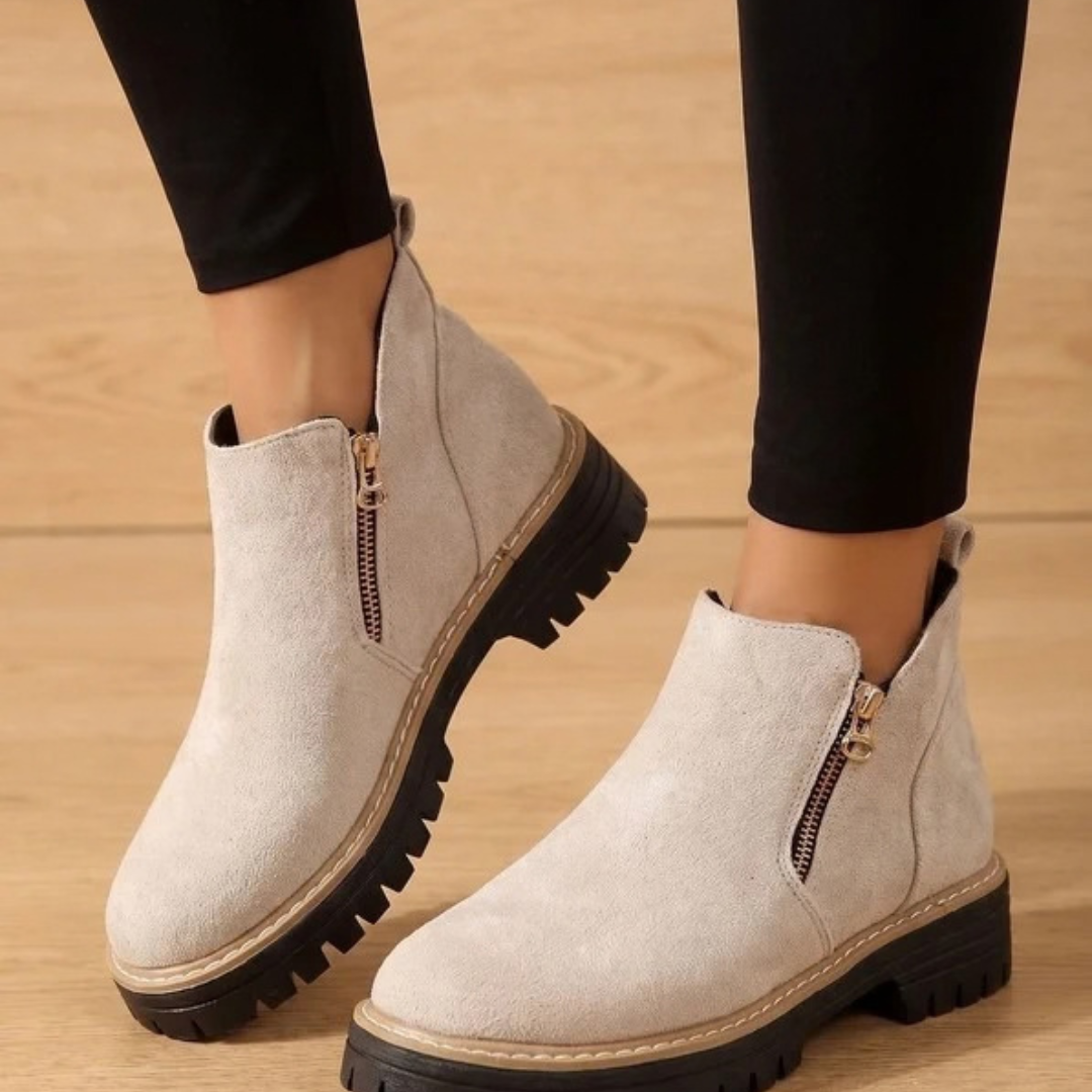 Women's ankle boots with side zips, low heels and lugged soles