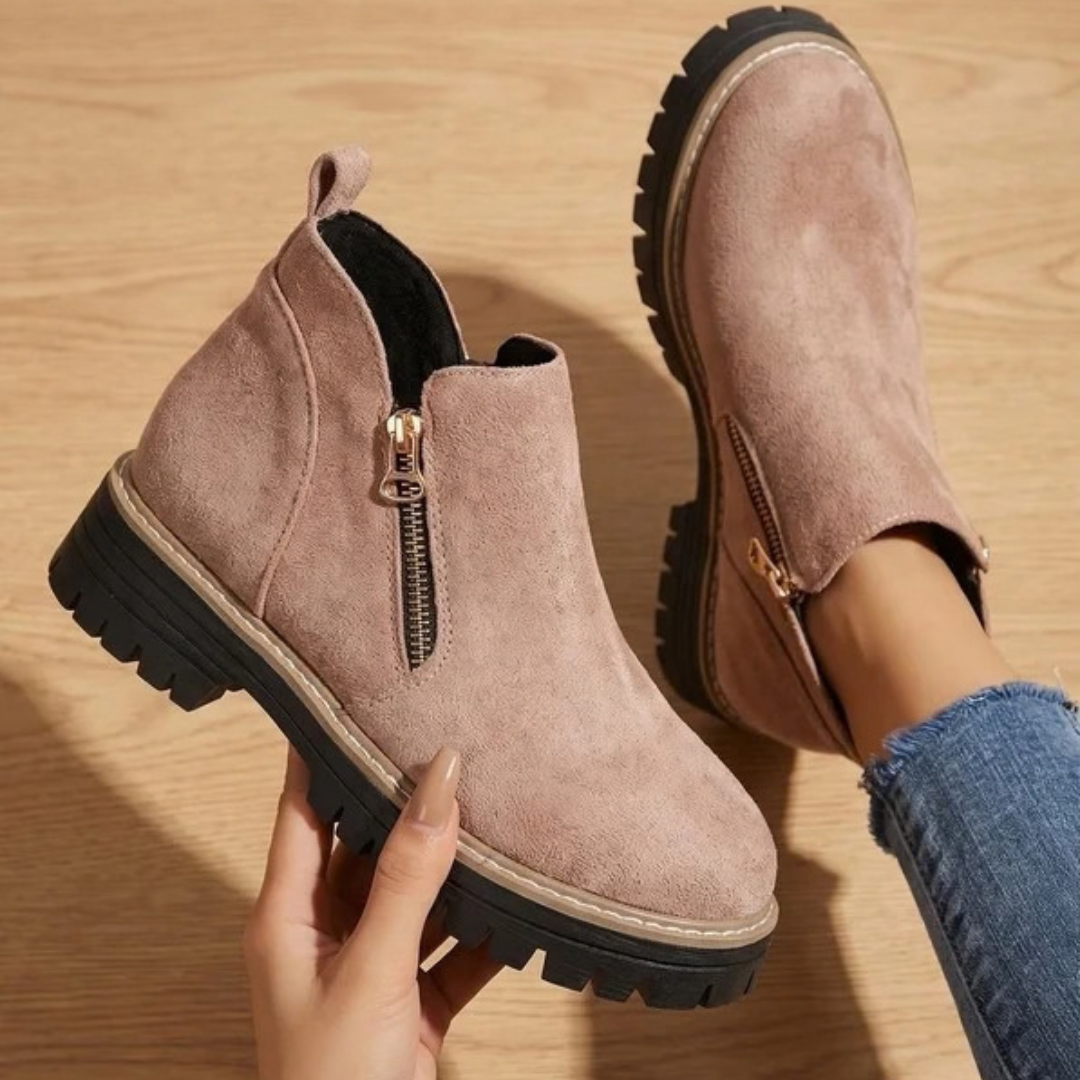 Women's ankle boots with side zips, low heels and lugged soles