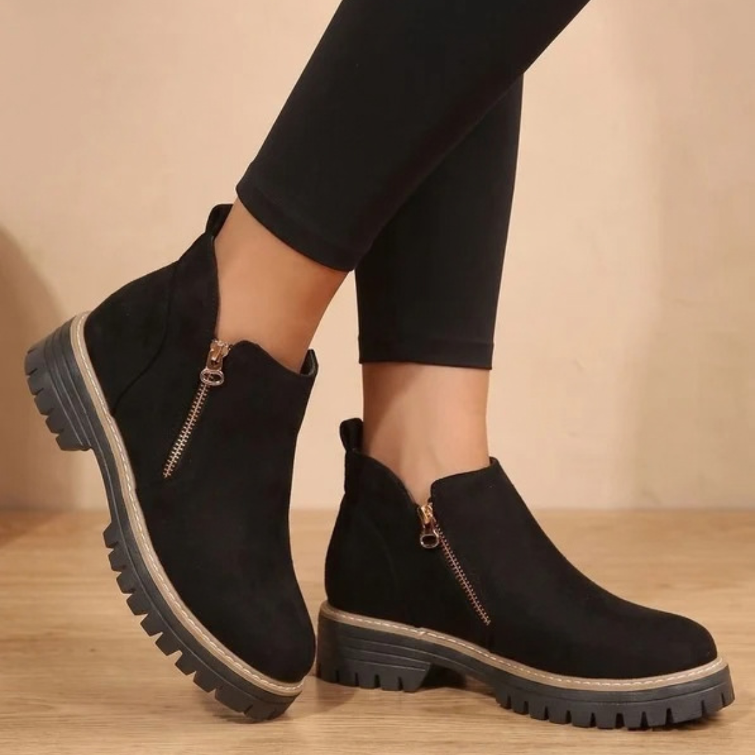 Women's ankle boots with side zips, low heels and lugged soles