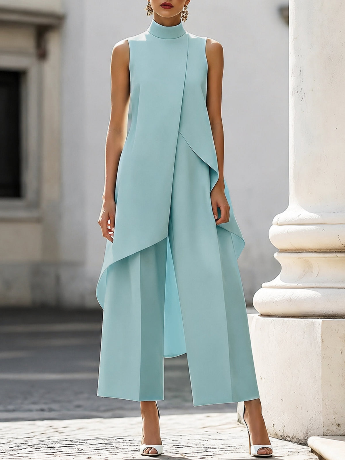 Women's sleeveless asymmetric mock neck top with wide-leg trousers