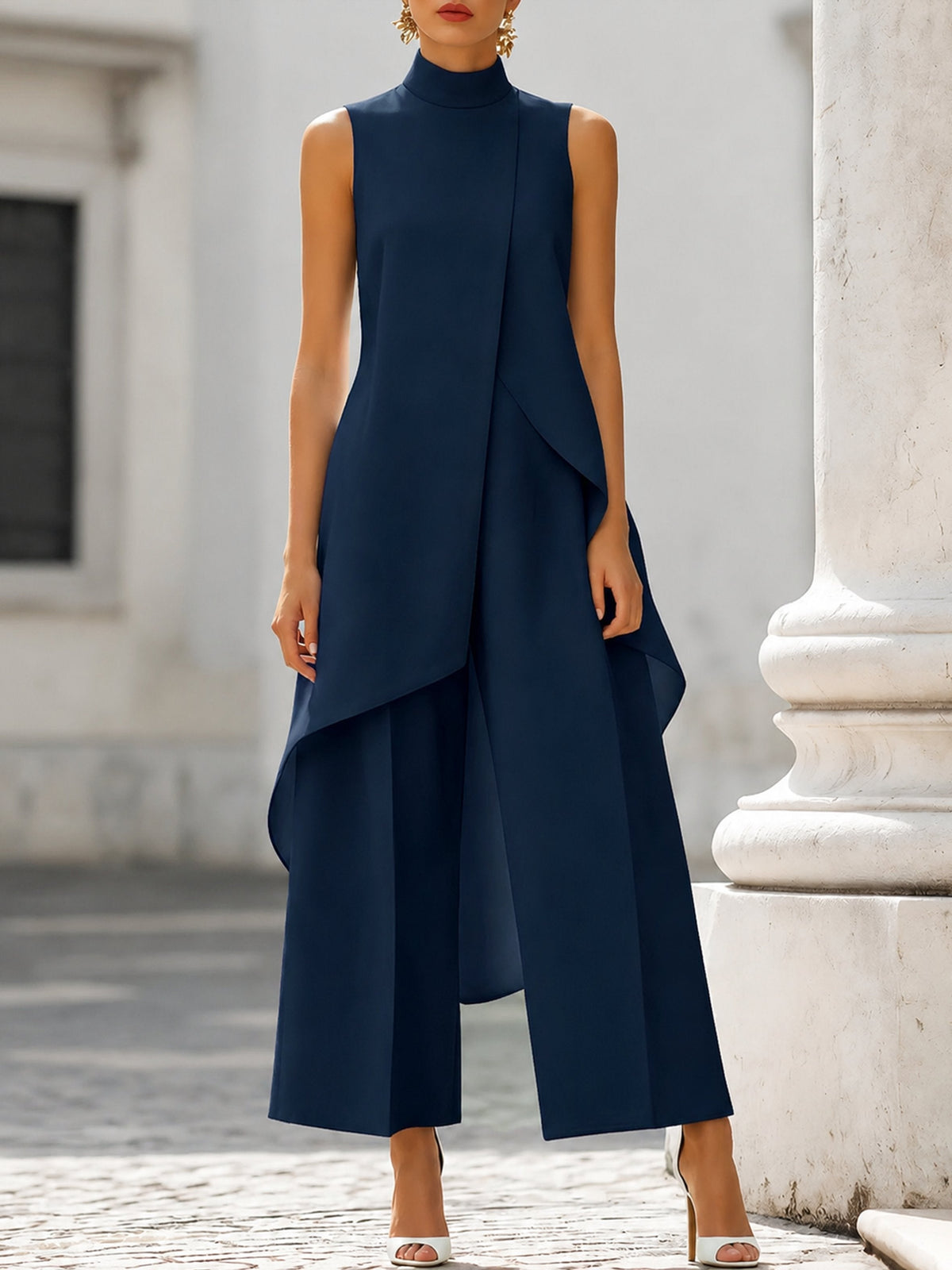 Women's sleeveless asymmetric mock neck top with wide-leg trousers