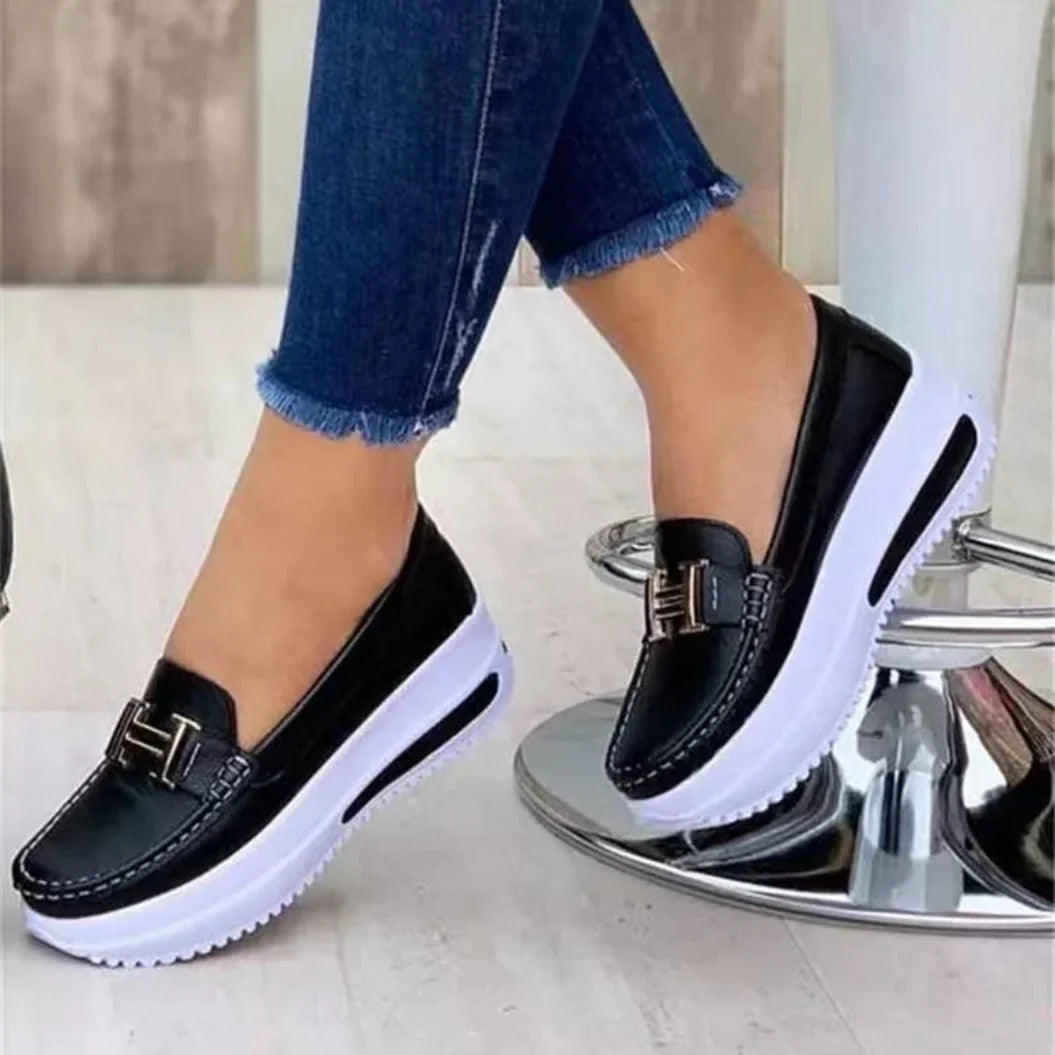 Women's platform moc toe loafers with slip-on design and metal bar trim