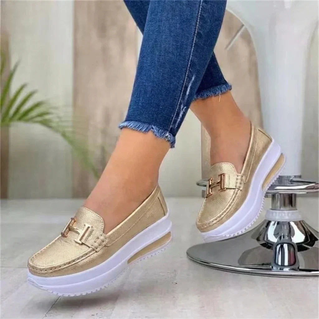 Women's platform moc toe loafers with slip-on design and metal bar trim
