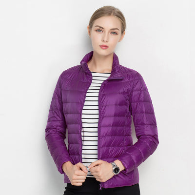 Women's quilted jacket with high collar, long sleeves and zip front