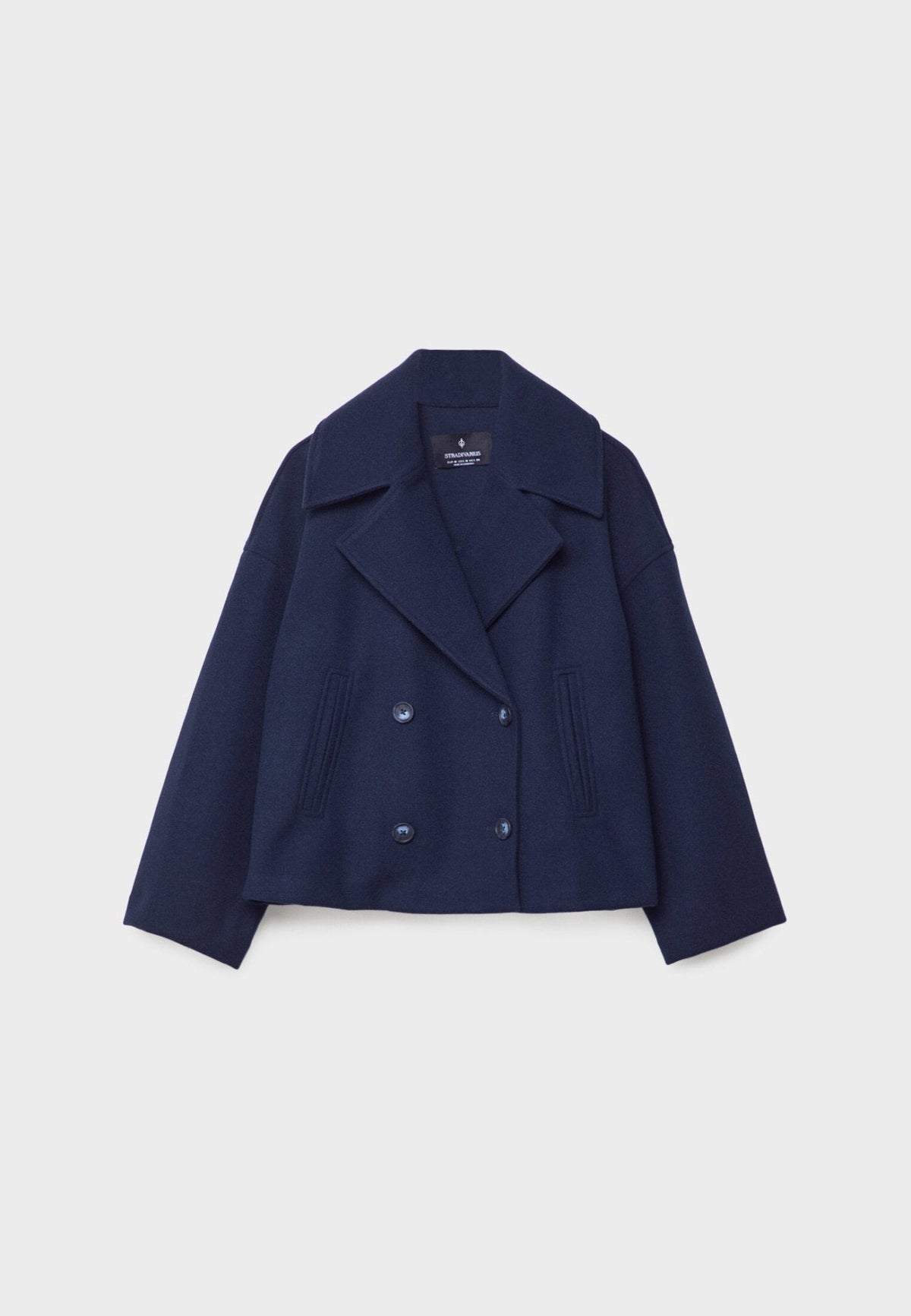 Women's cropped double-breasted jacket with wide lapels and welt pockets