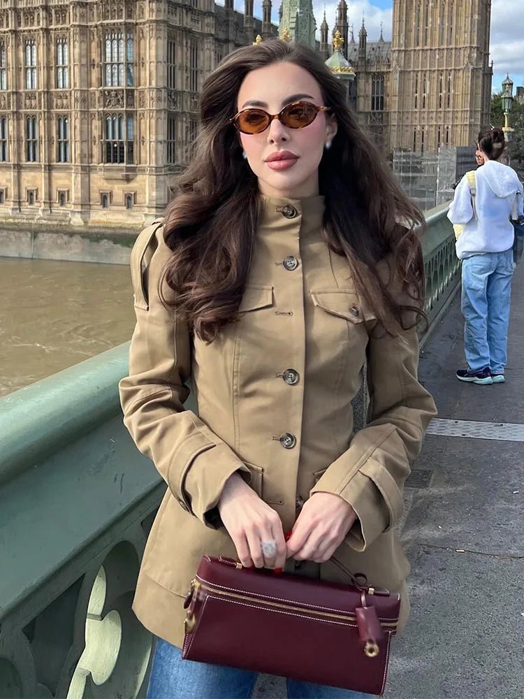 Women's beige fitted utility jacket with high neck, long sleeves and flap pockets