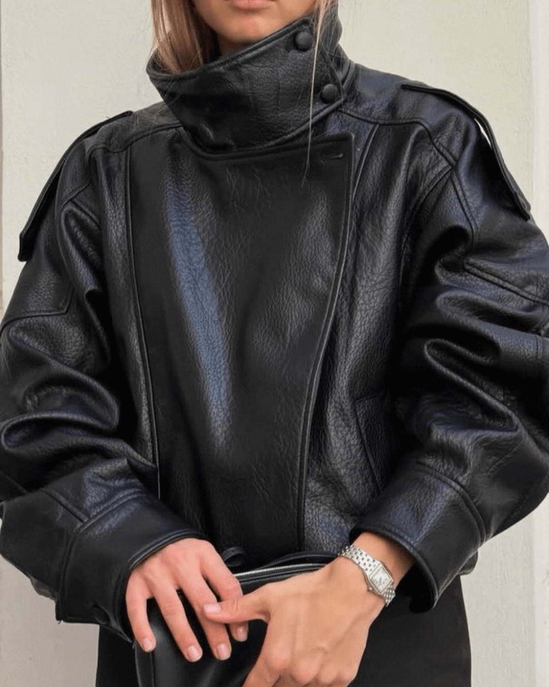 Women's asymmetric black biker jacket with high collar and diagonal zip