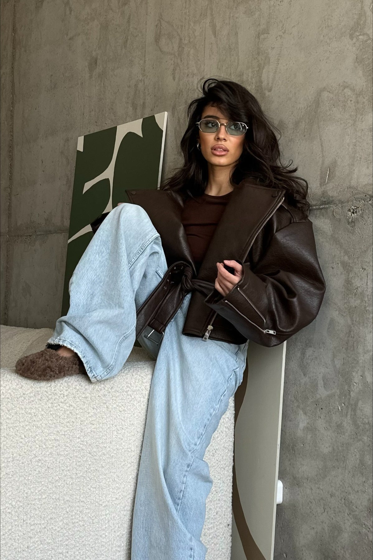 Women's dark brown biker jacket with asymmetric zip, lapels and waist belt