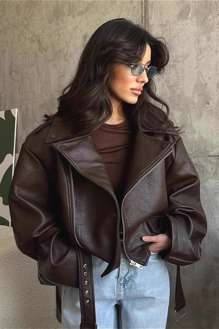 Women's dark brown biker jacket with asymmetric zip, lapels and waist belt