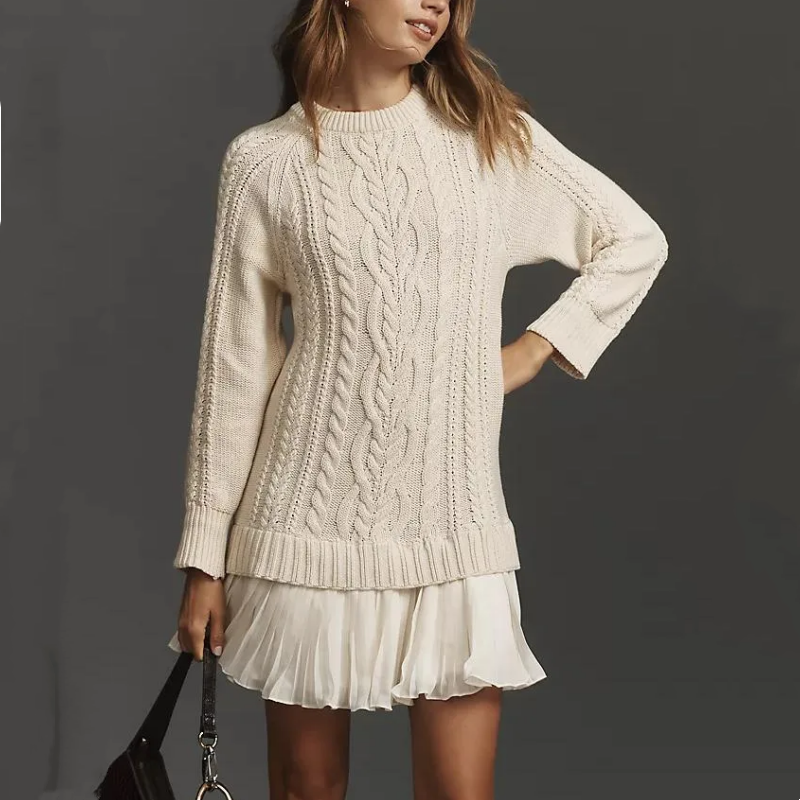 Women's cable knit mini dress with crew neck, long sleeves and pleated skirt panel