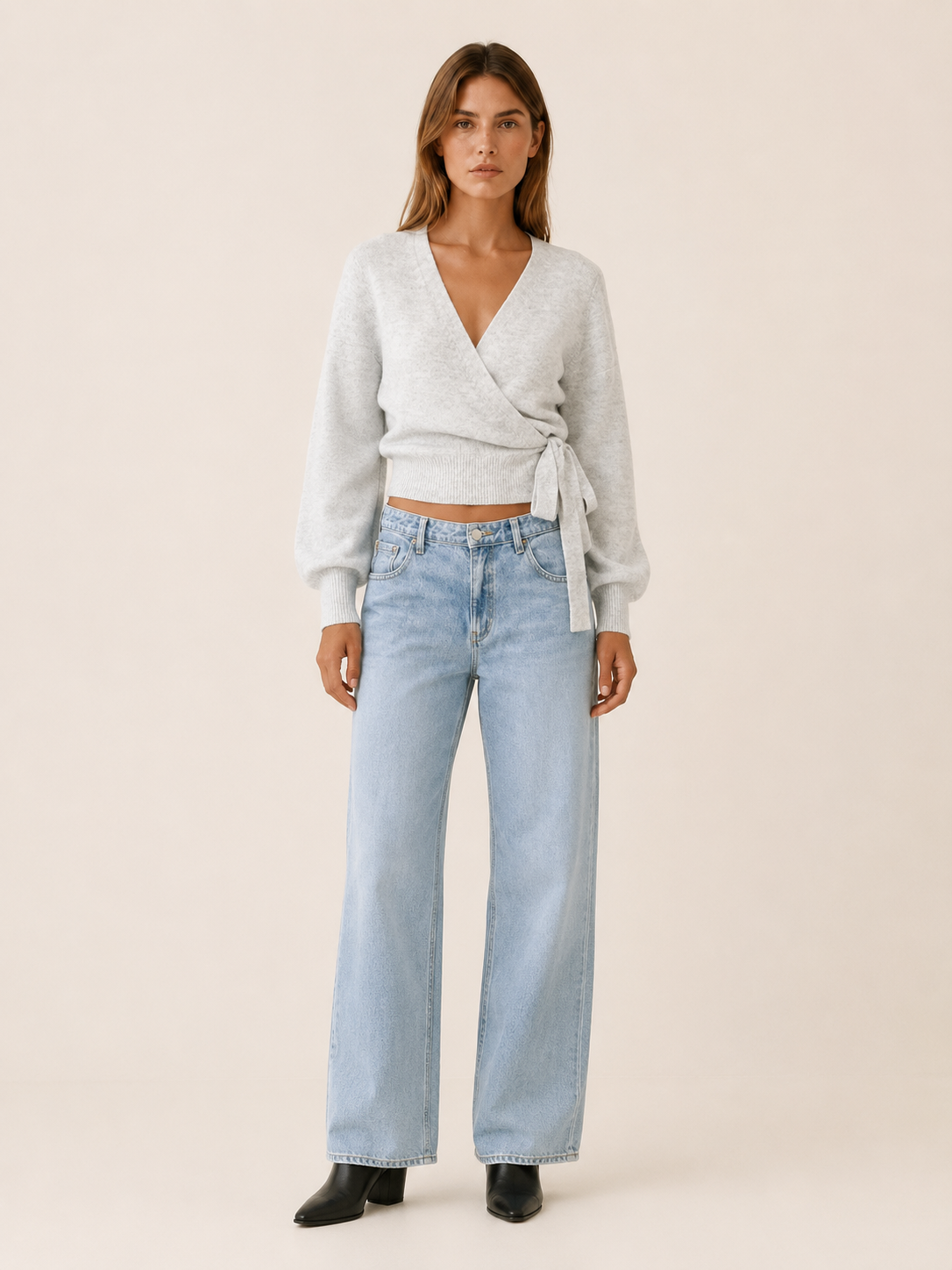 Women's wrap knit jumper with V-neckline, long sleeves and waist tie