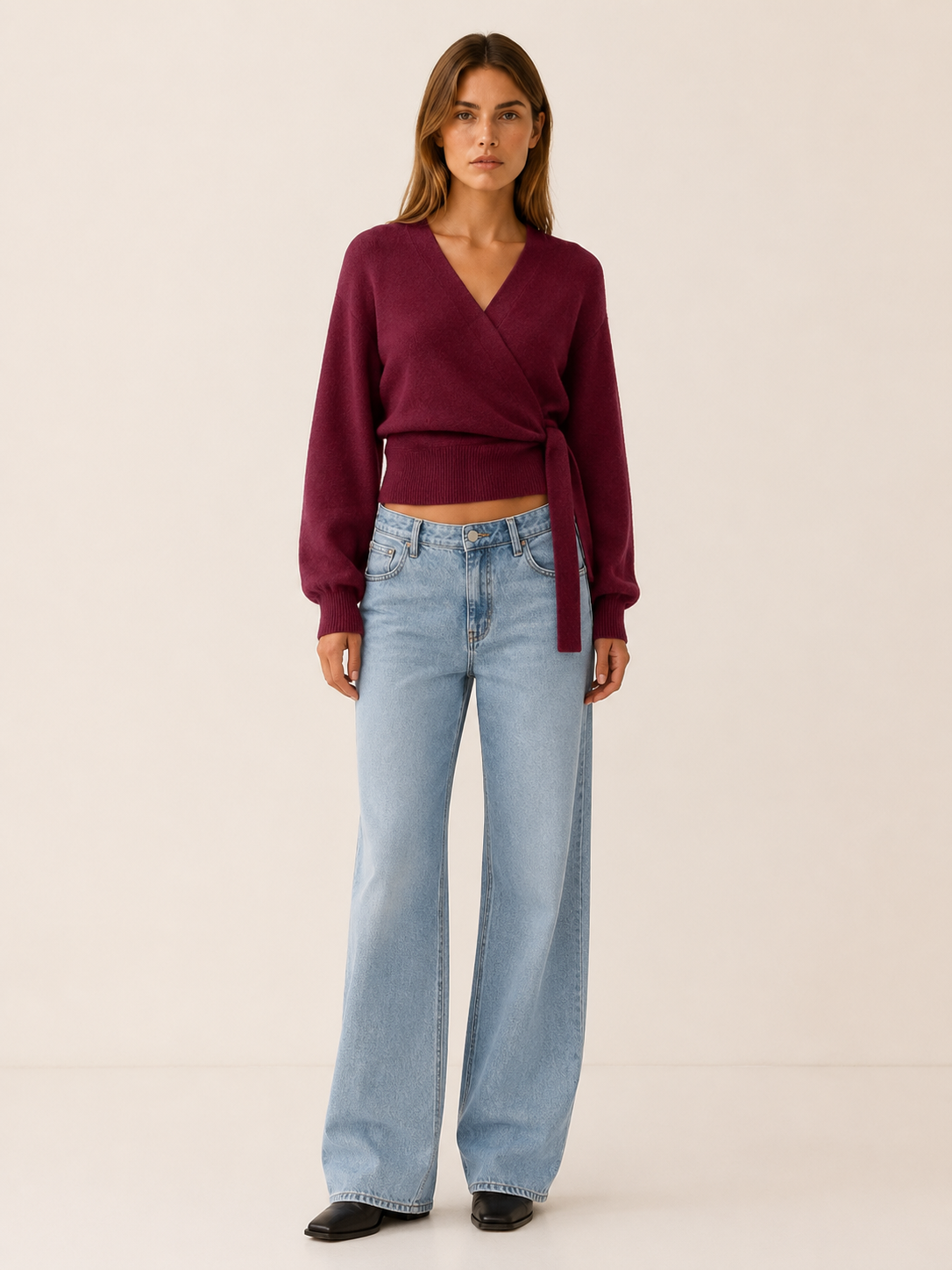 Women's wrap knit jumper with V-neckline, long sleeves and waist tie