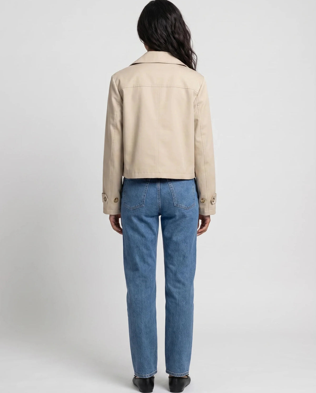 Women's beige cropped double-breasted trench jacket with long sleeves and cuff straps