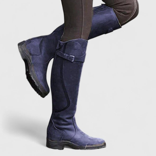 Women's knee-high panelled boots with buckle straps and low heels