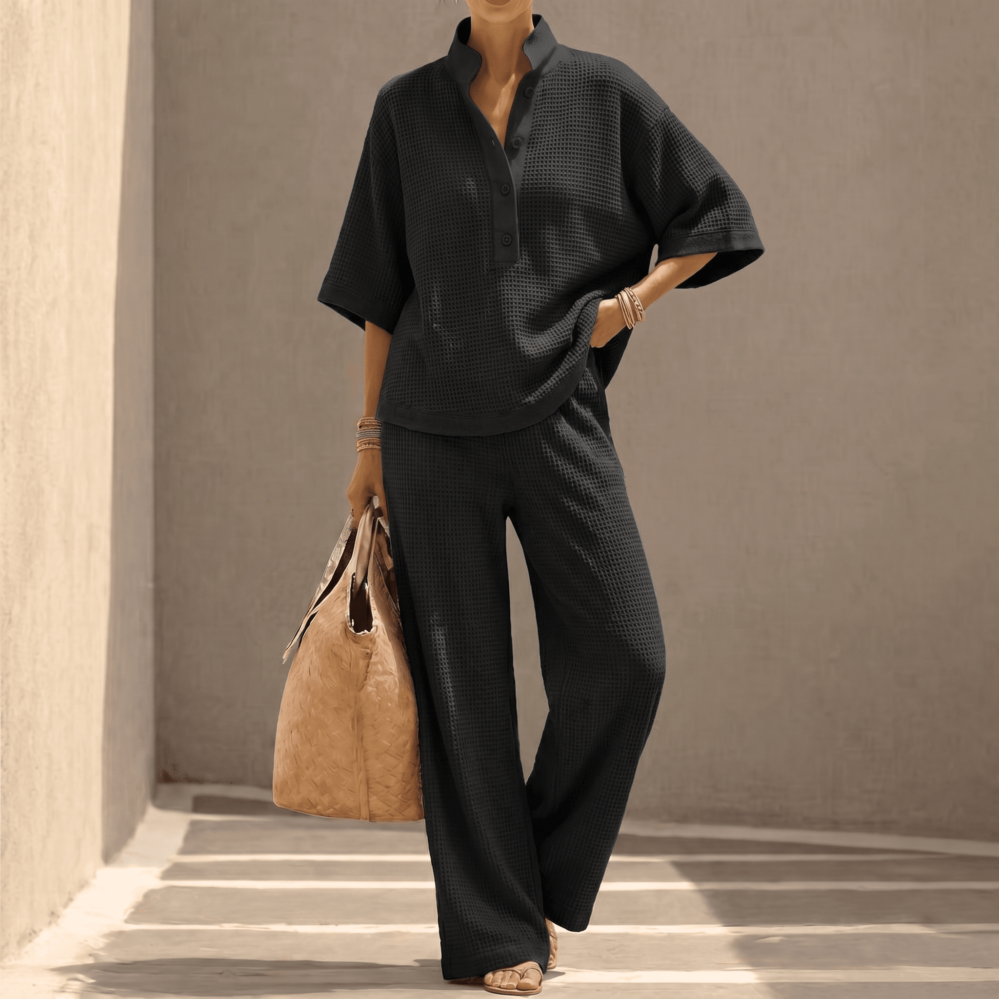 Women's textured two-piece set with mandarin collar top and wide-leg trousers