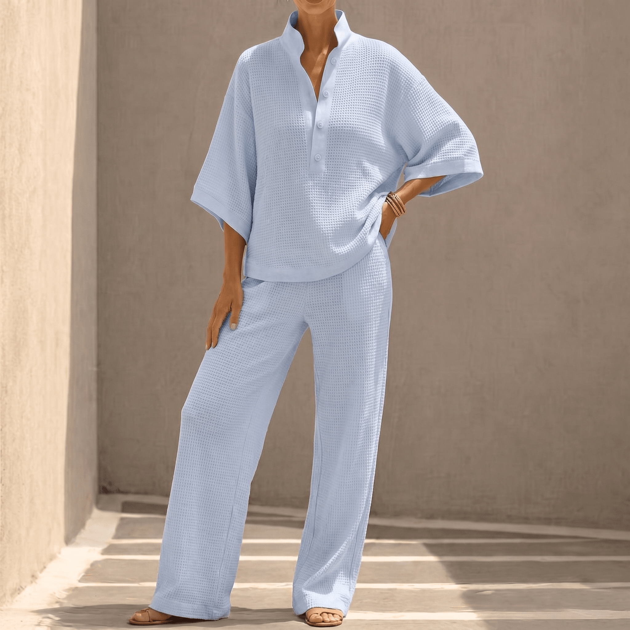 Women's textured two-piece set with mandarin collar top and wide-leg trousers