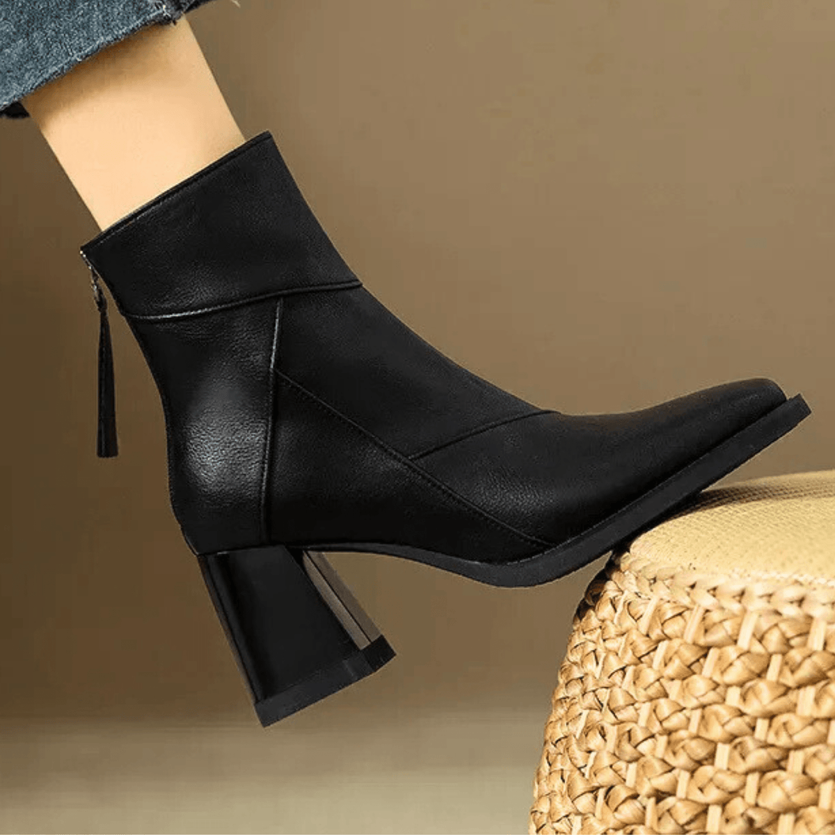 Women's pointed toe ankle boots with high flared block heels and stitched panel details