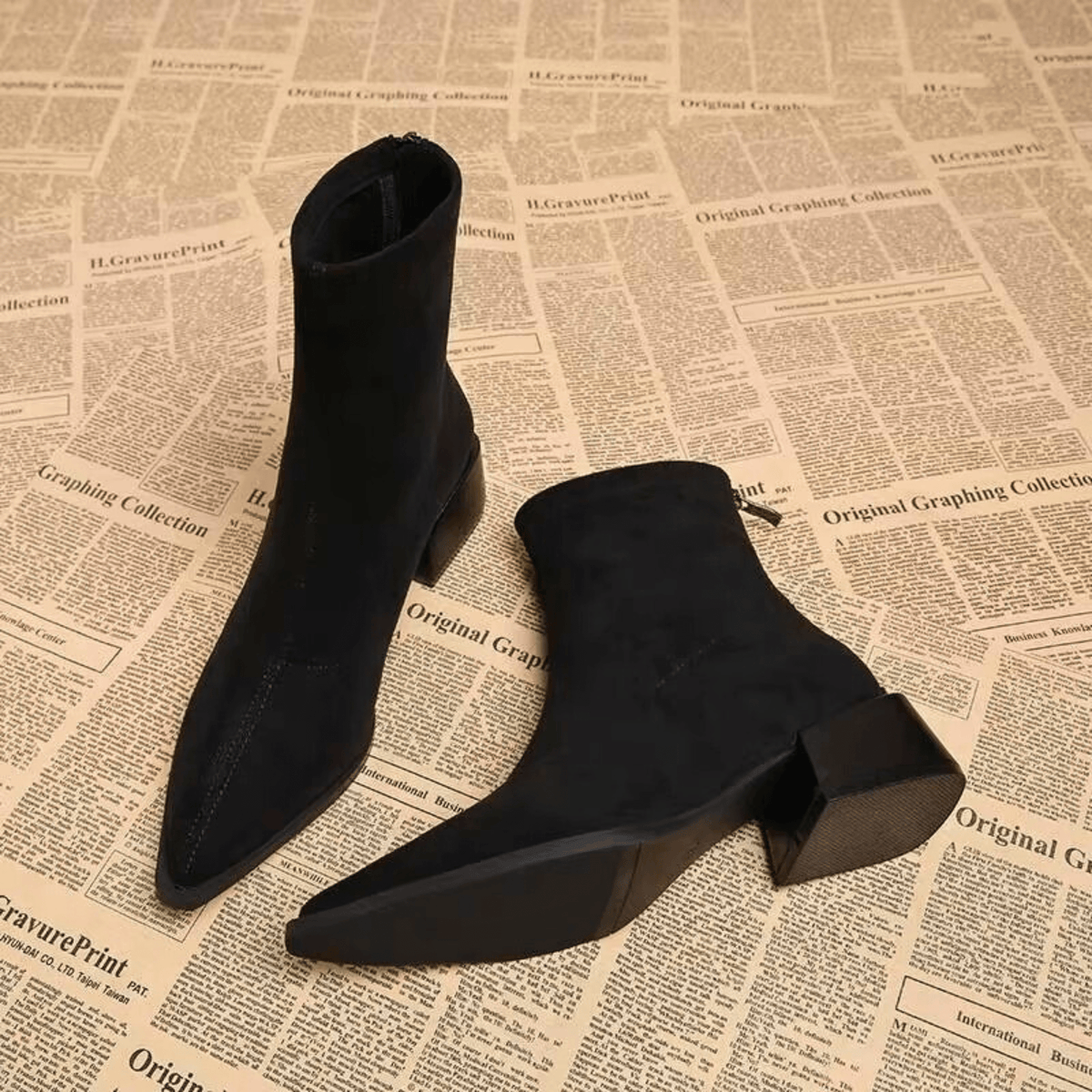 Women's pointed-toe ankle boots with leopard print uppers and block heels
