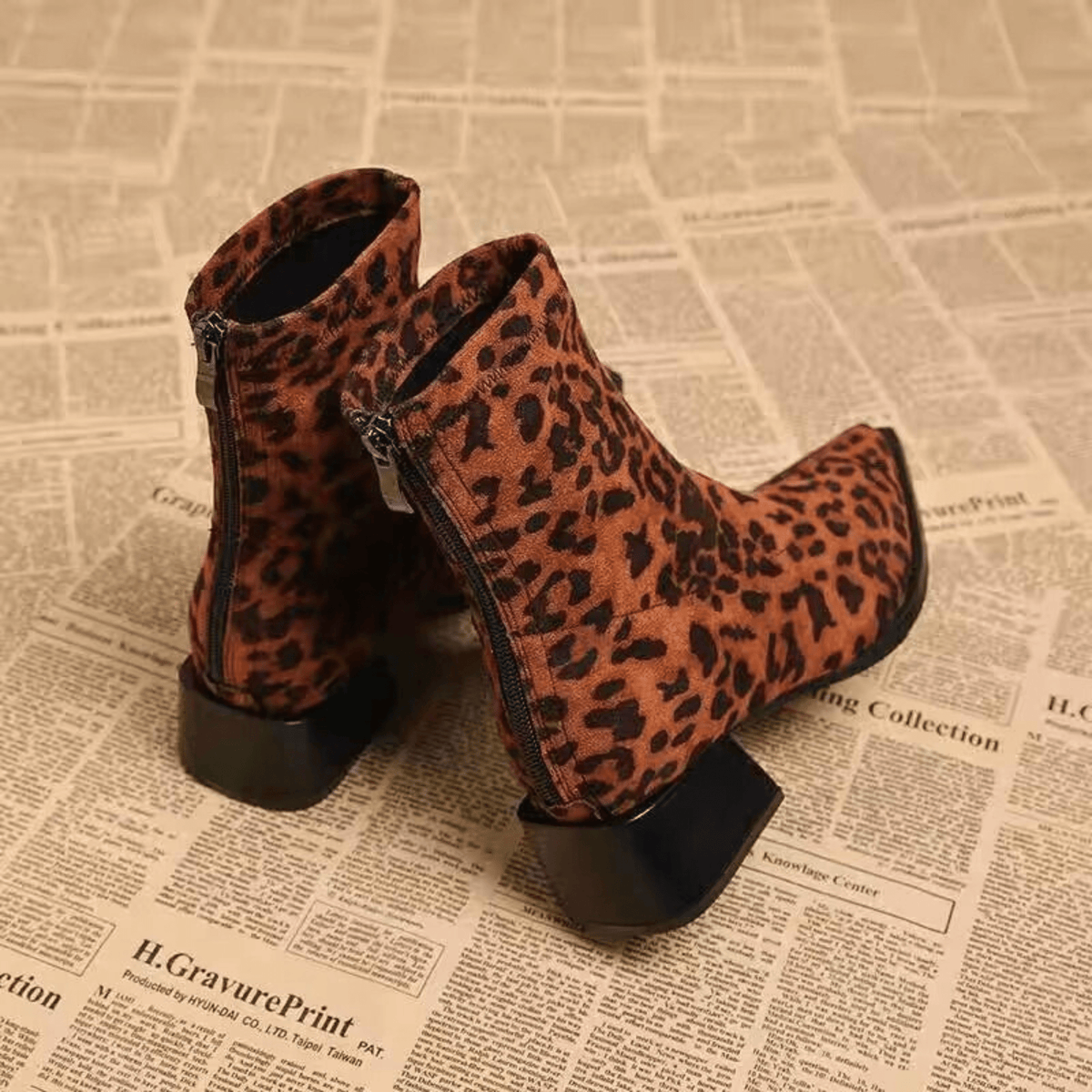 Women's pointed-toe ankle boots with leopard print uppers and block heels