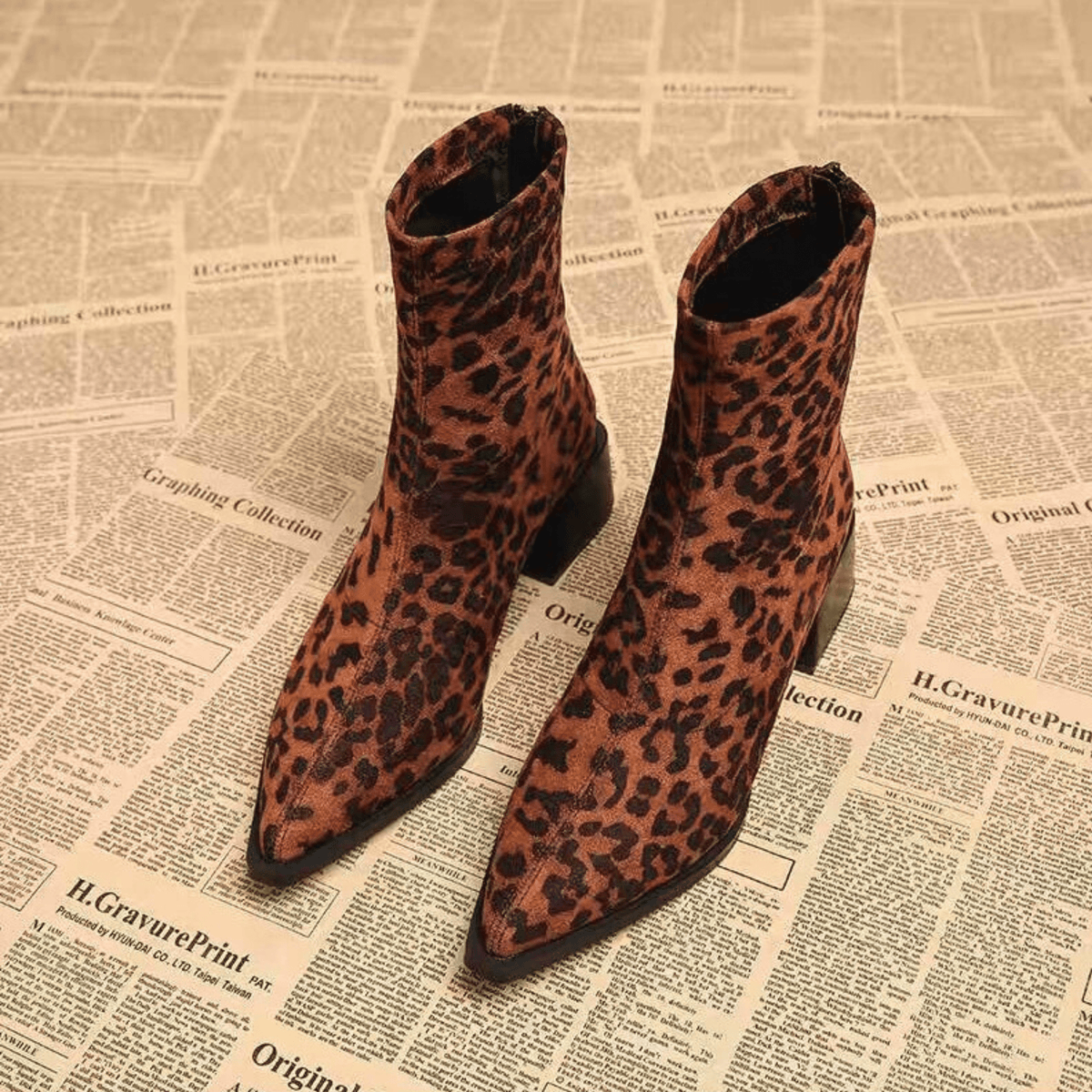 Women's pointed-toe ankle boots with leopard print uppers and block heels