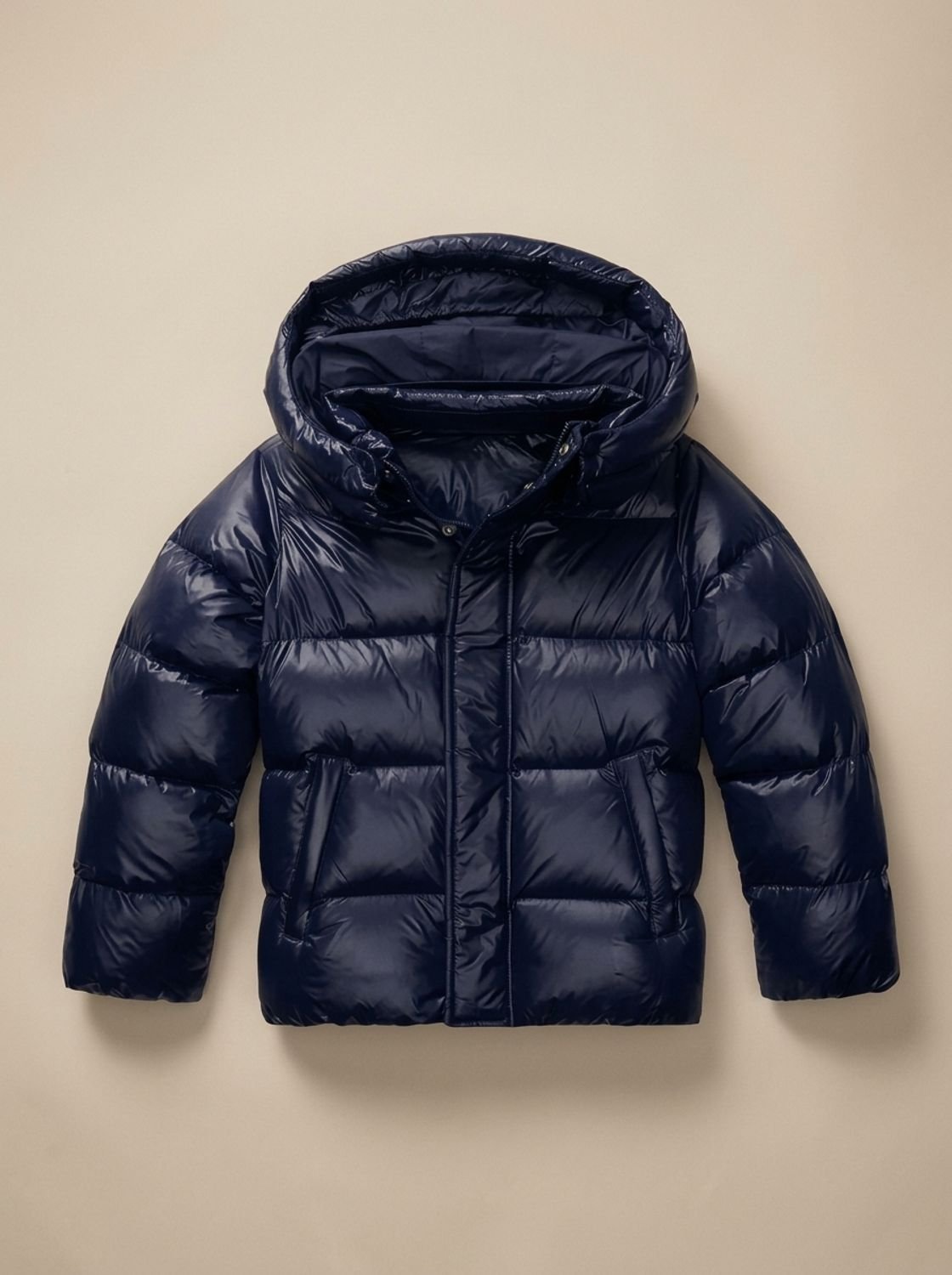 Women's hooded quilted puffer jacket with long sleeves and zip front
