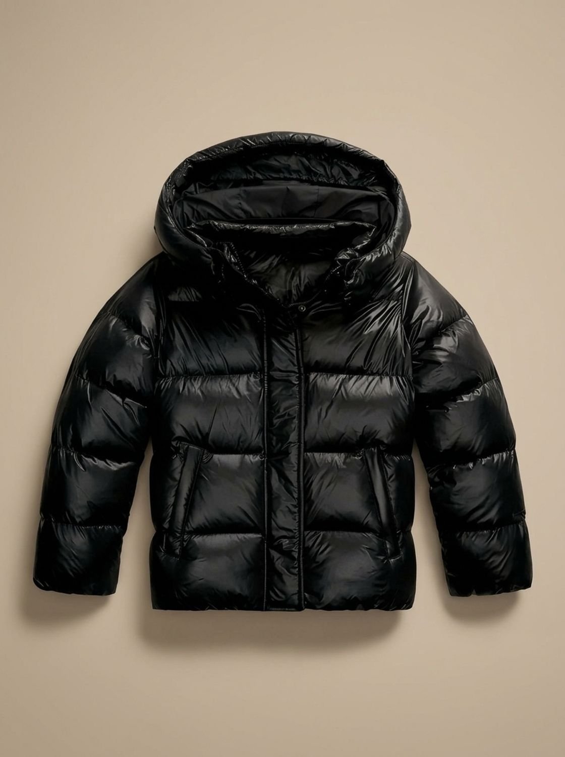 Women's hooded quilted puffer jacket with long sleeves and zip front