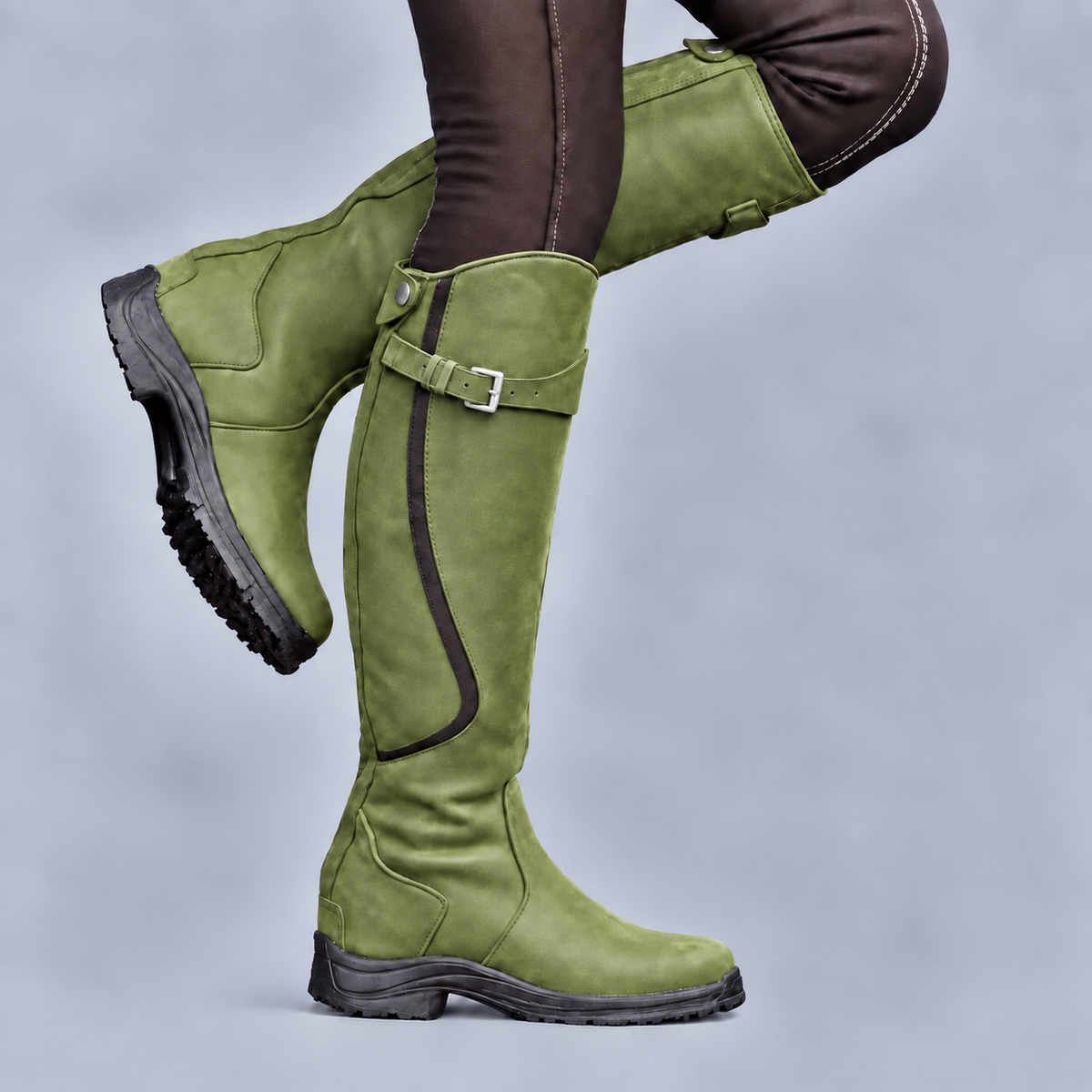 Women's tall riding boots with buckle straps and rugged tread soles