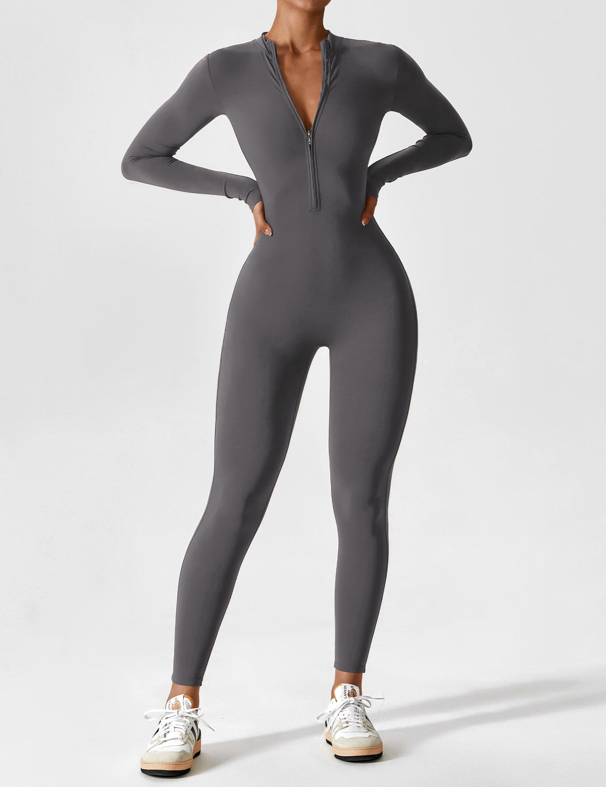 Women's fitted long-sleeve jumpsuit with mock neck, front zip and full-length legs