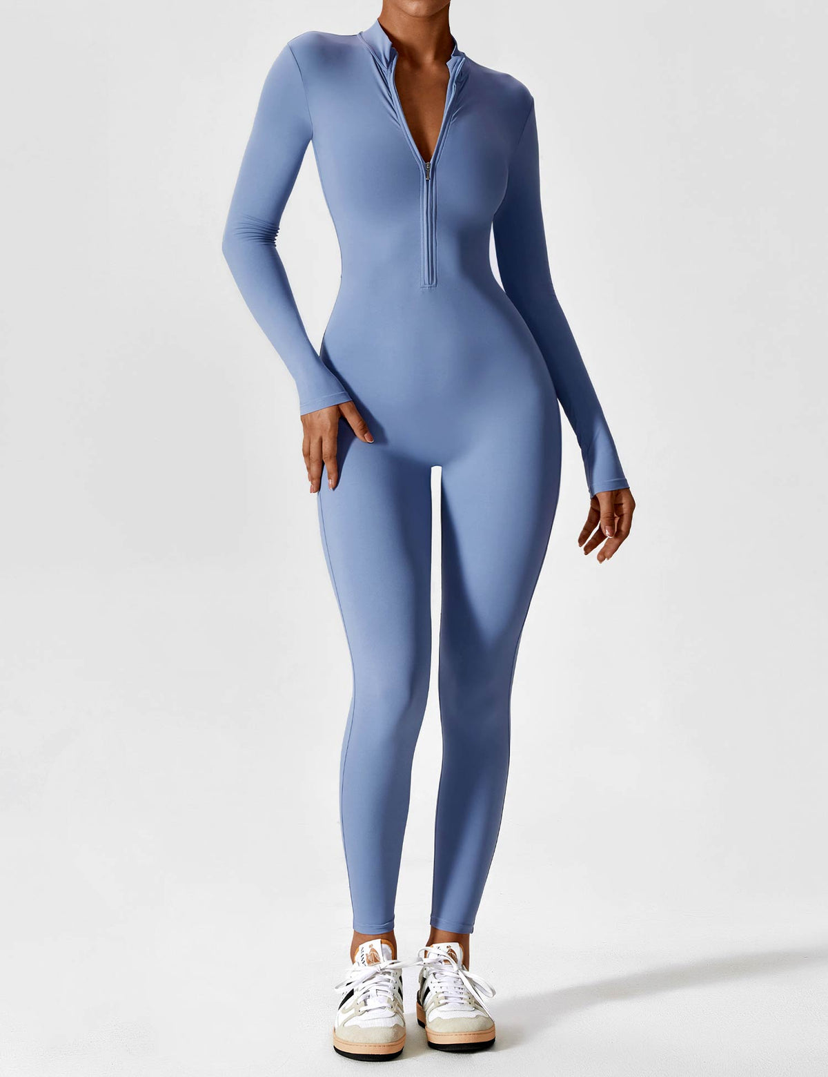 Women's fitted long-sleeve jumpsuit with mock neck, front zip and full-length legs