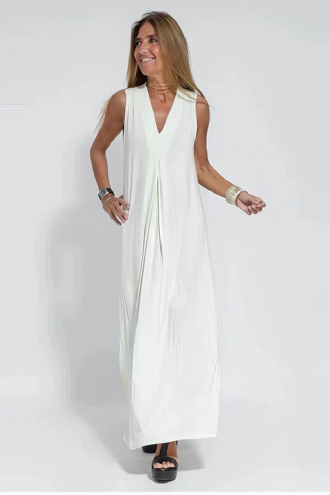 Women's sleeveless V-neck maxi dress with flowing full-length skirt